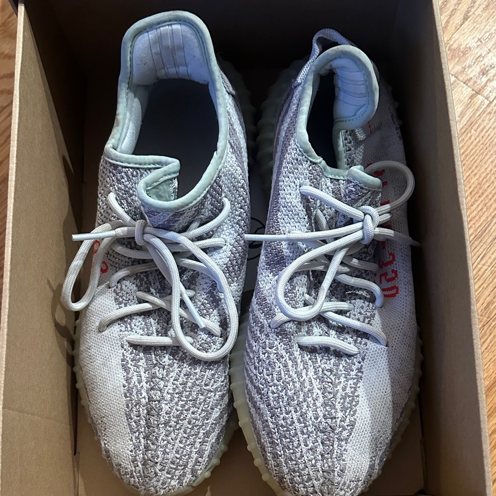 Yeezy Gray and Red Athletic Shoes